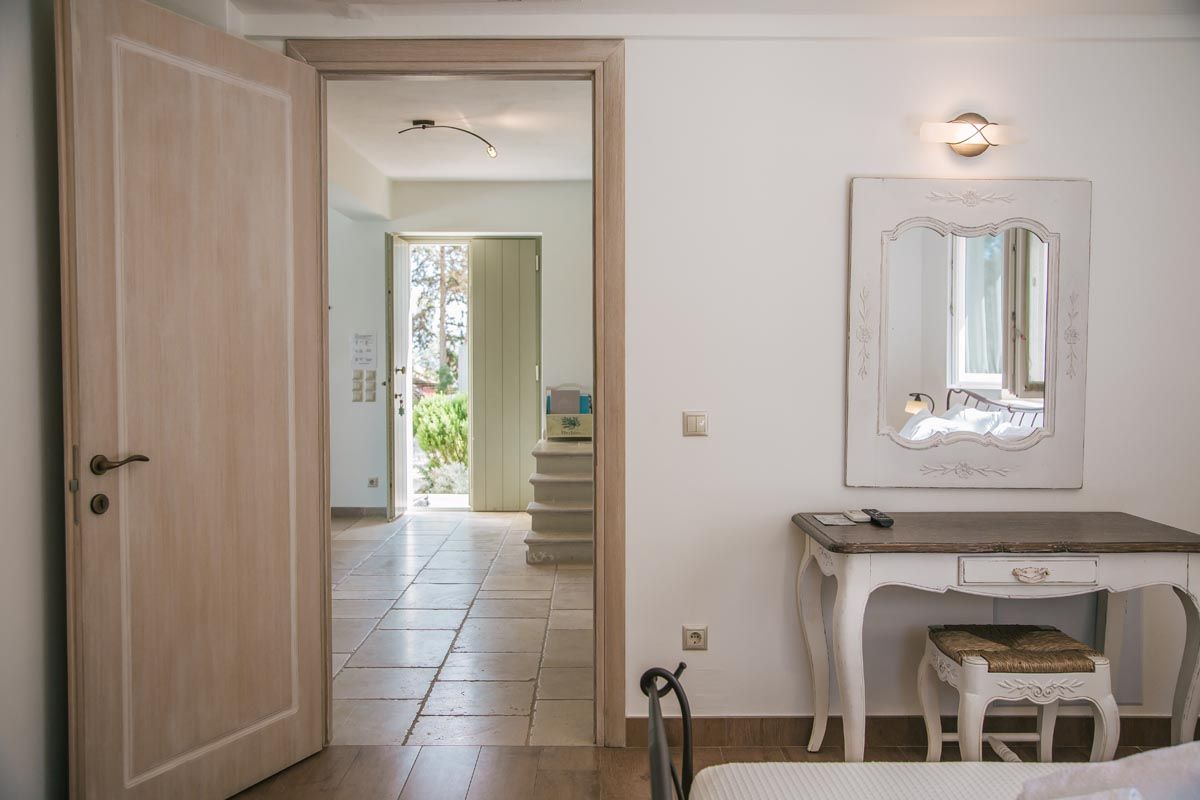 Dressing area with mirror and console table at Mistral House