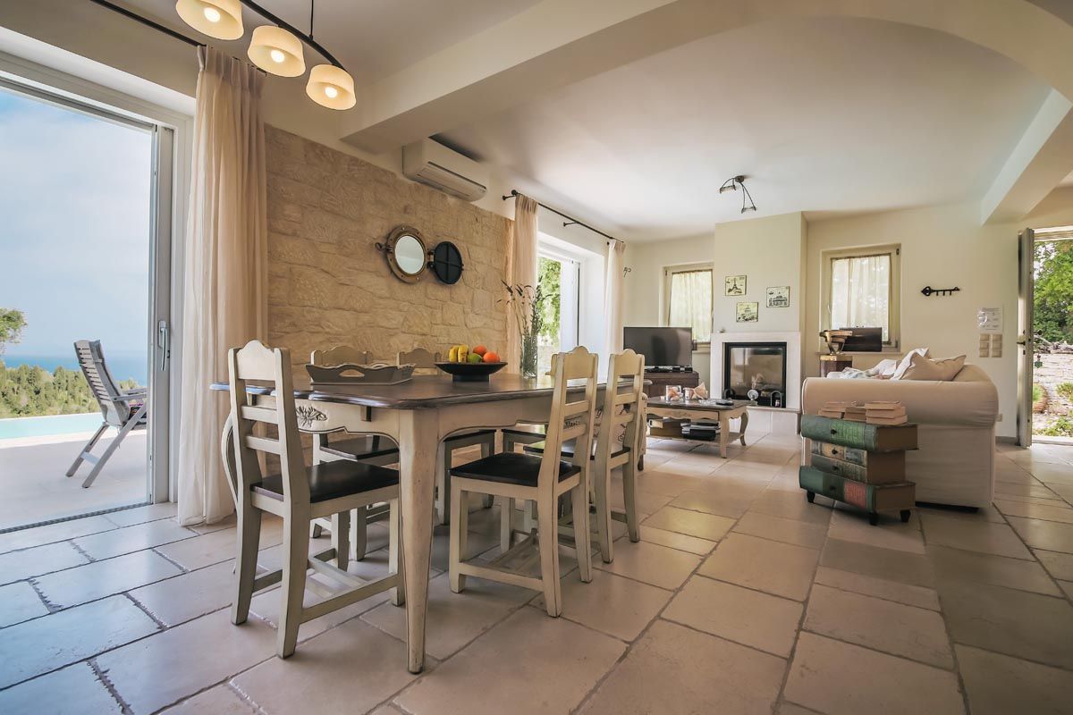 Dining table in the open-plan living space at Mistral House